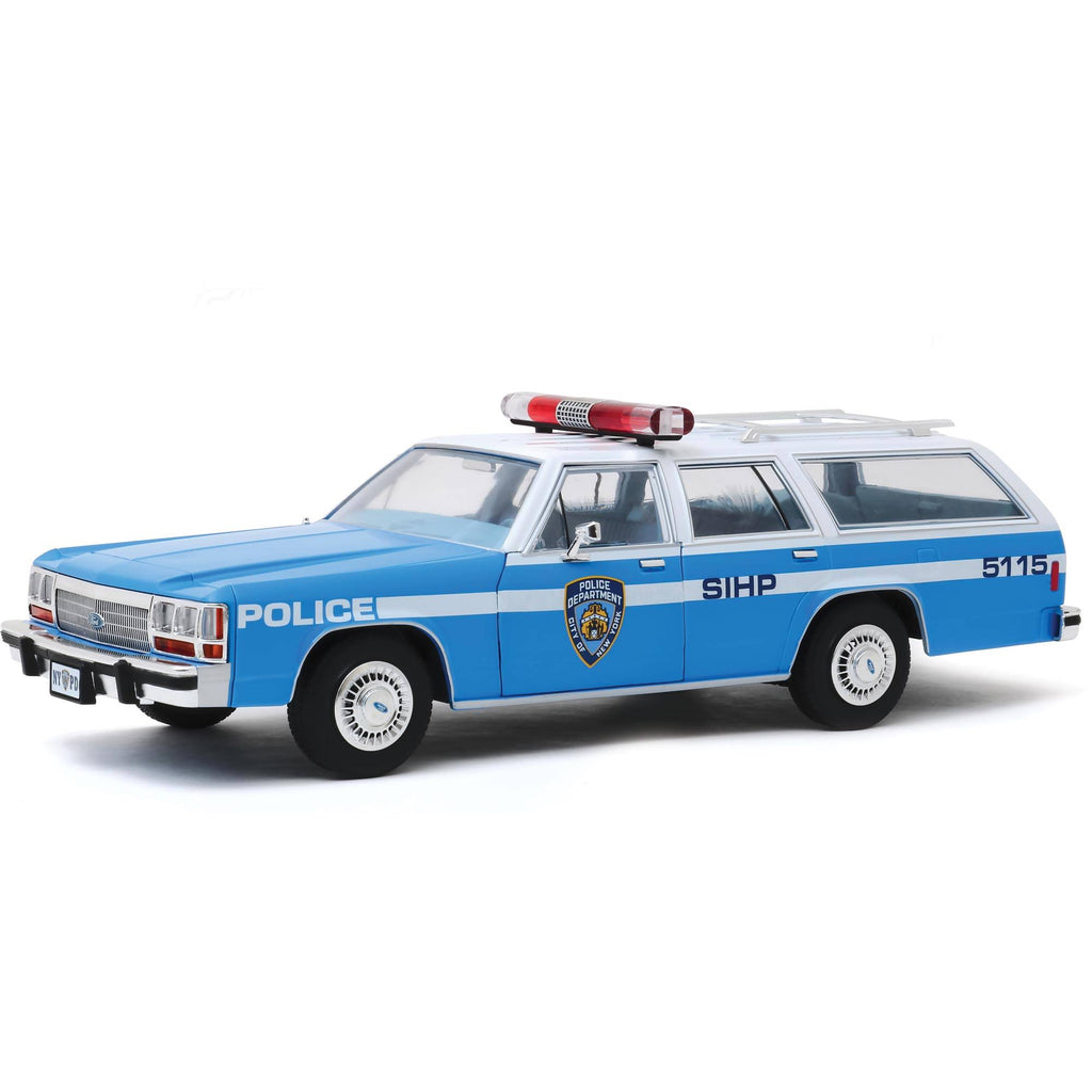 1988 Ford LTD Crown Victoria Wagon Light Blue and White 1/18 Diecast Model Car E77824