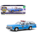 1988 Ford LTD Crown Victoria Wagon Light Blue and White 1/18 Diecast Model Car E77824